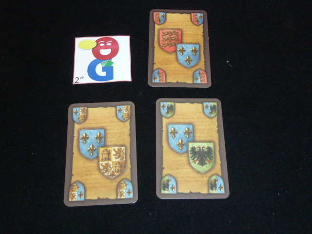 The 3 different varieties of intrigue cards that involve France (the blue country)